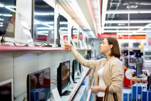 Woman making large purchase with deferred interest credit card